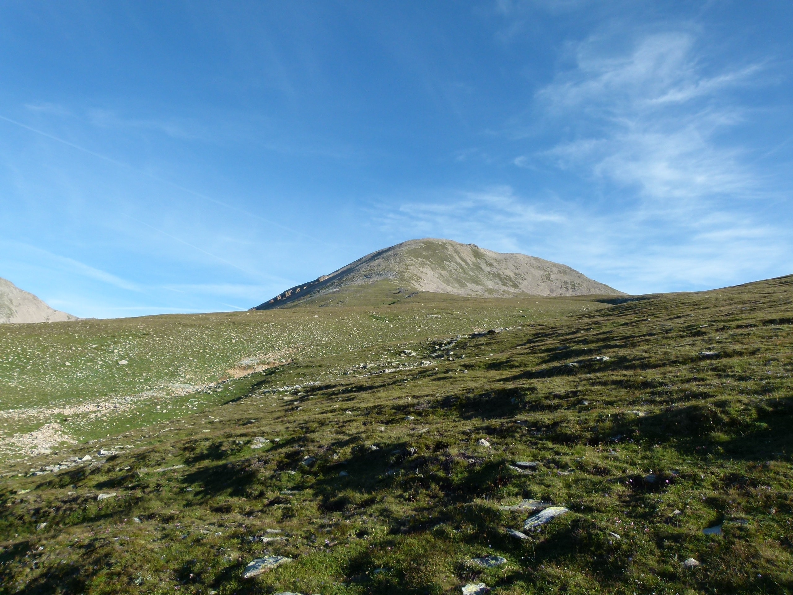 The Pic de Bastiments from the Coll de la Marrana, over grassland